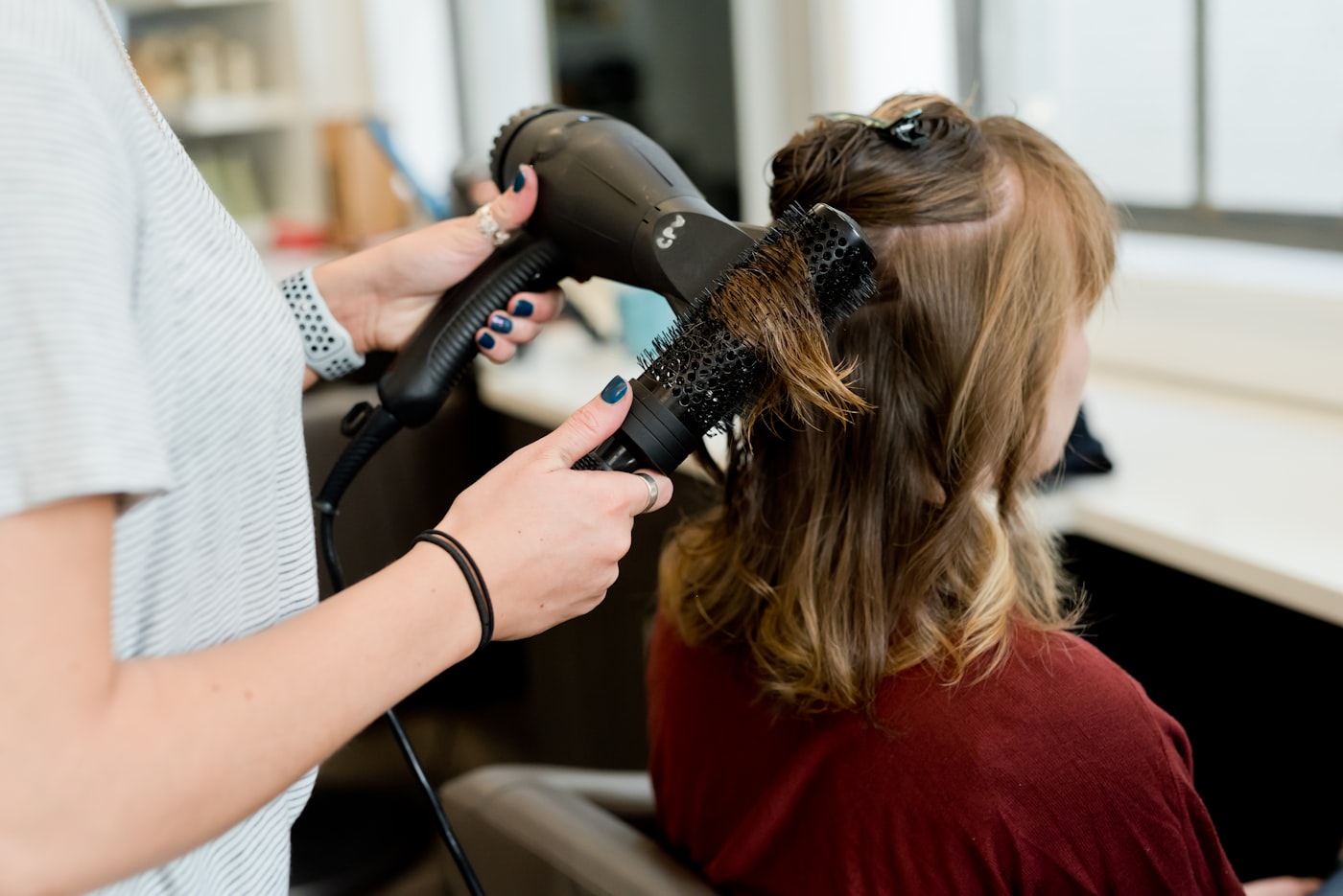 A blow-dry finished with a round brush